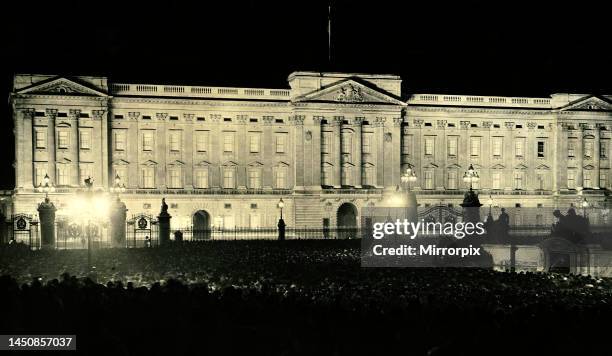 Crowds gather outside the gates of Buckingham Palace following the coronation of George VI. May 1937.