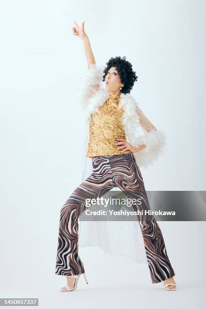 senior woman creating contemporary dance - eccentric hobby stock pictures, royalty-free photos & images