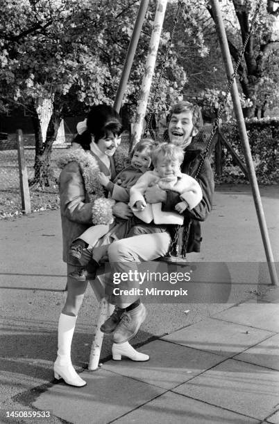 Family pictures of Alan and Maureen Rothwell, with babies Toddy and Ben months, playing on the swings and slides at their local play ground. November...