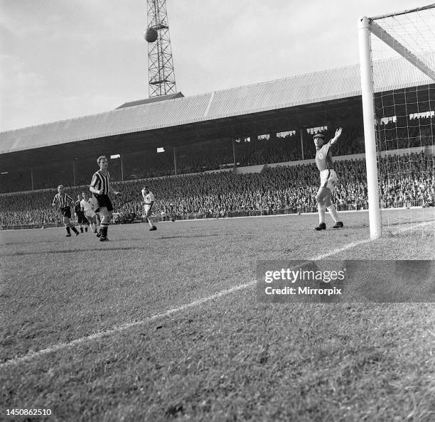 Sheffield United versus Liverpool in 1959. Liverpool's keeper Rudham and United's Pace watch as a Simpson header goes wide. 5th September 1959.