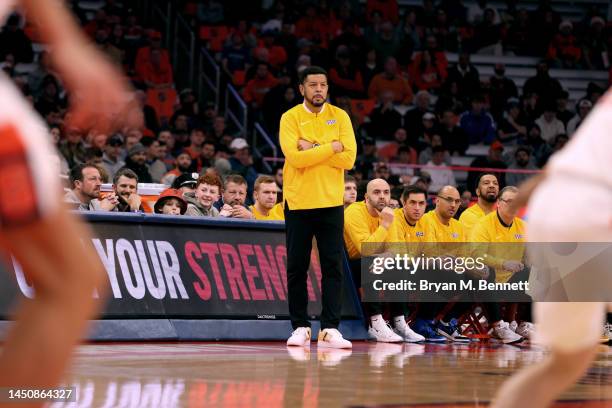 Head Coach Jeff Capel III of the Pittsburgh Panthers looks on during the first half against the Syracuse Orange at JMA Wireless Dome on December 20,...