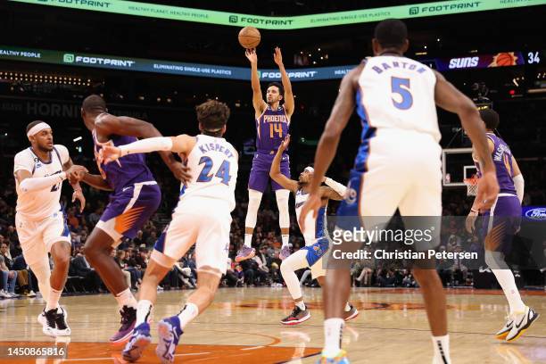 Landry Shamet of the Phoenix Suns puts up a three-point shot against the Washington Wizards during the first half of the NBA game at Footprint Center...