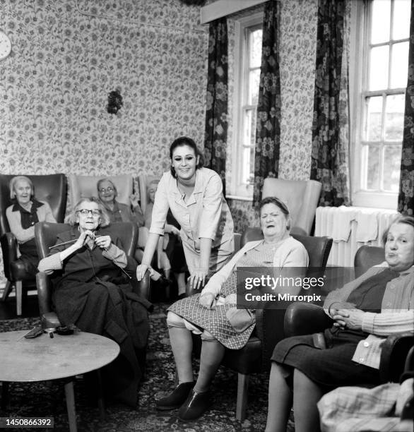 Miss Pat Browne who is an assistant nurse at the Alexandra House, Maitland Park Road, Hampstead, a home for old ladies. Pat Browne in mini skirt in...