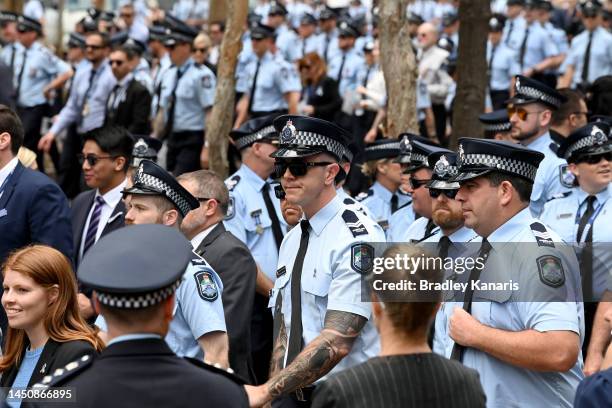 Large crowd of Poloice Officers gather to form a guard of honour as Police Officers pay their respects on December 21, 2022 in Brisbane, Australia....