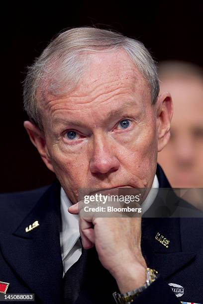 Martin Dempsey, chairman of the Joint Chiefs of Staff, listens during a Senate Foreign Relations Committee hearing in Washington, D.C., U.S., on...