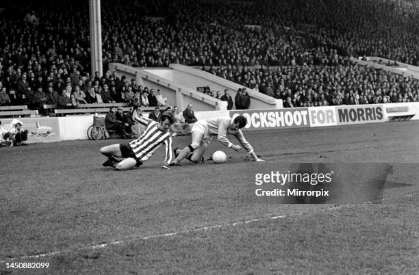 English League Division match at Maine Road. Manchester City versus Southampton. A well timed sliding tackle by Mike Doyle robs Mick Channon of the...