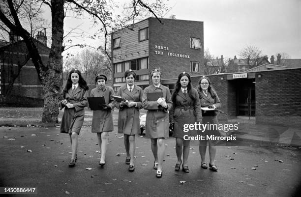 Schoolgirls near Liverpool's Sefton Park out on an urban trip as part of their geography lesson. November 1969.