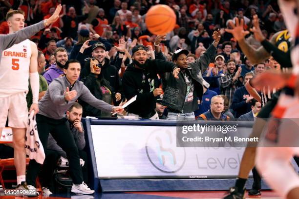 Josh Allen, Gabe Davis, and Stefon Diggs react during the second half of a game between the Syracuse Orange and the Pittsburgh Panthers at JMA...