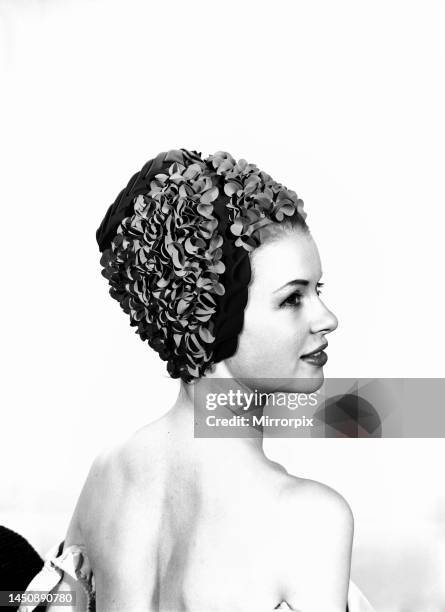 Model Vyvyan Dunbar wearing a bathing hat. Circa 1963.