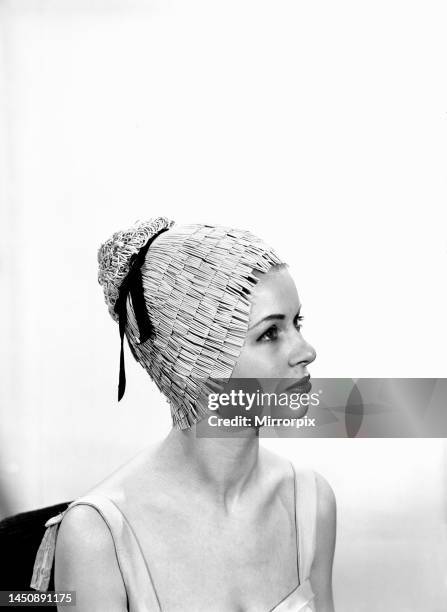 Model Vyvyan Dunbar wearing a bathing hat. Circa 1963.