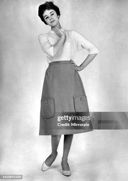 Jackie Jackson modelling a pocketed skirt. September 1960.