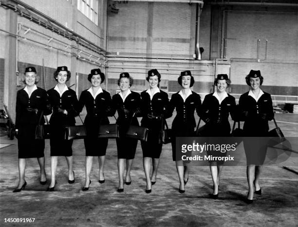 Air stewardesses line up wearing their uniforms. 22nd January 1963.