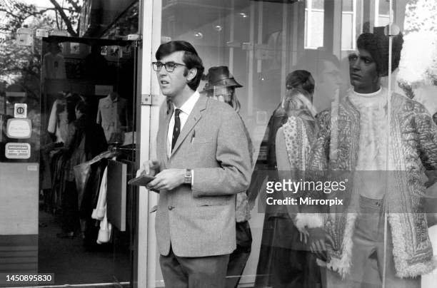 John Alderton, lead actor in the TV series Please Sir filming in Kings road, Chelsea looks in the window of the boutique Skin. November 1969.