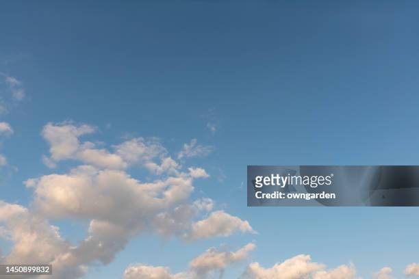 white colour clouds against blue sky - clear sky clouds stock pictures, royalty-free photos & images