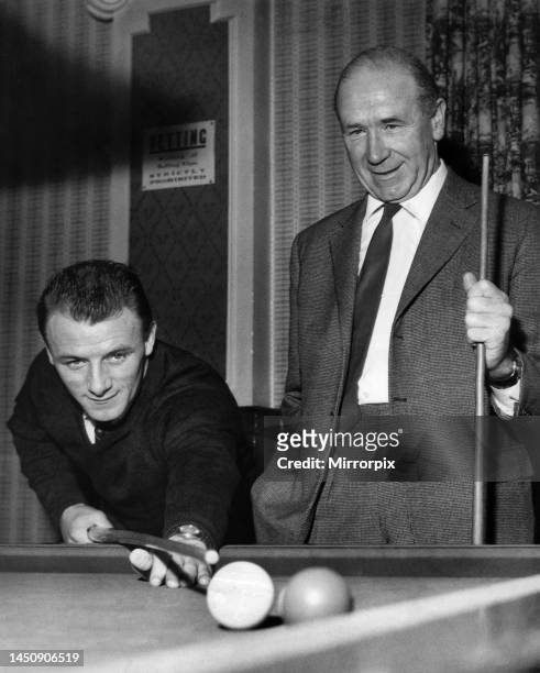 Even football managers need to relax - the first division's newest manager Tommy Docherty, of Chelsea, has a game of snooker with Matt Busby at the...