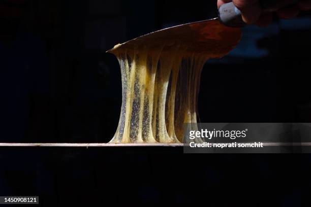 closeup rubber adhesive that is used in general and in factories - sticky fotografías e imágenes de stock
