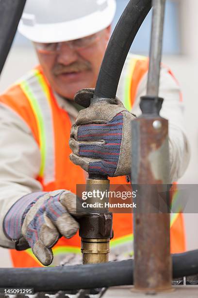Tanker Top Loading Fuel Tanker Hose Photos and Premium High Res Pictures - Getty Images