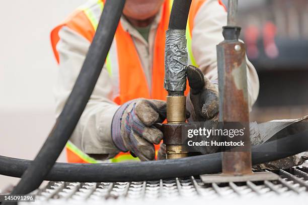 Tanker Top Loading Fuel Tanker Hose Photos and Premium High Res Pictures - Getty Images