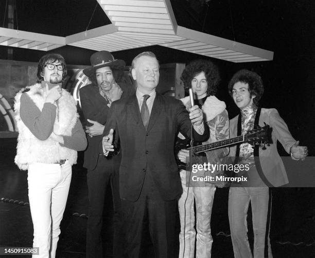 Godfrey Winn, in December 1967, makes singing debut on television, with Jimi Hendrix, Jonathan King, Noel Redding and Mitch Mitchell, rehearsing in...