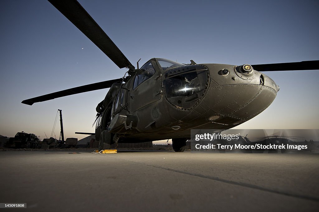 A UH-60L Blackhawk sits on its pad at the German PRT in Afghanistan.