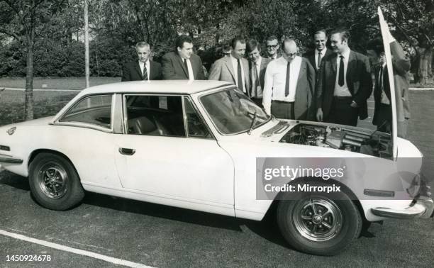 British Leyland service and technical specialists from many European countries examine a Coventry-built Triumph Stag during a visit to the city for a...