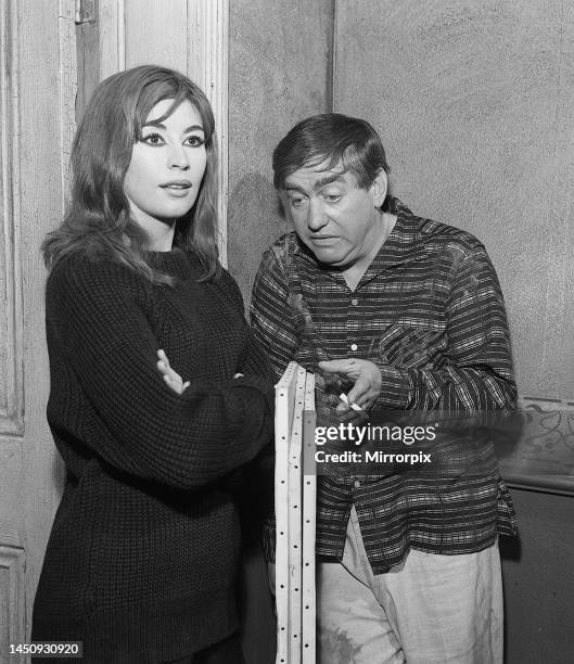 Tony Hancock and Nanette Newman on set at Elstree Studios during filming of the comedy film Rebel. July 1960. Born 12th may 1924. Hancock's first...