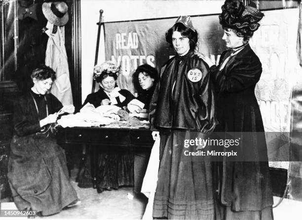 Dress rehearsal for Suffragettes November 1908Suffragettes pictured trying on prison garb which they will wear when they parade outside Holloway Jail...