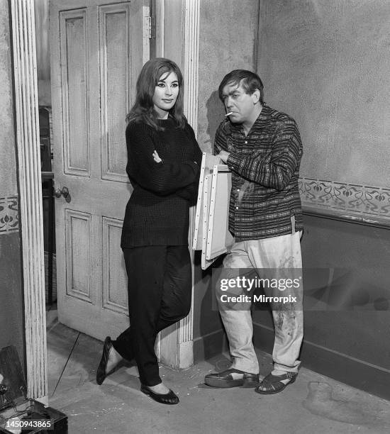 Tony Hancock and Nanette Newman on set at Elstree Studios during filming of the comedy film Rebel. July 1960. Born 12th may 1924. Hancock's first...