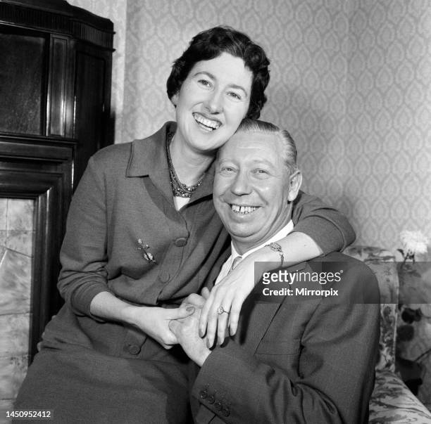 George Formby and fiancee Pat Howsen of Preston pictured at her home last night. She is wearing the huge solitaire diamond ring on her engagement...