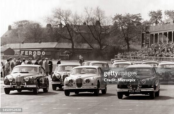 Saloon Racing The start of the saloon car race at the International '200' meeting ...