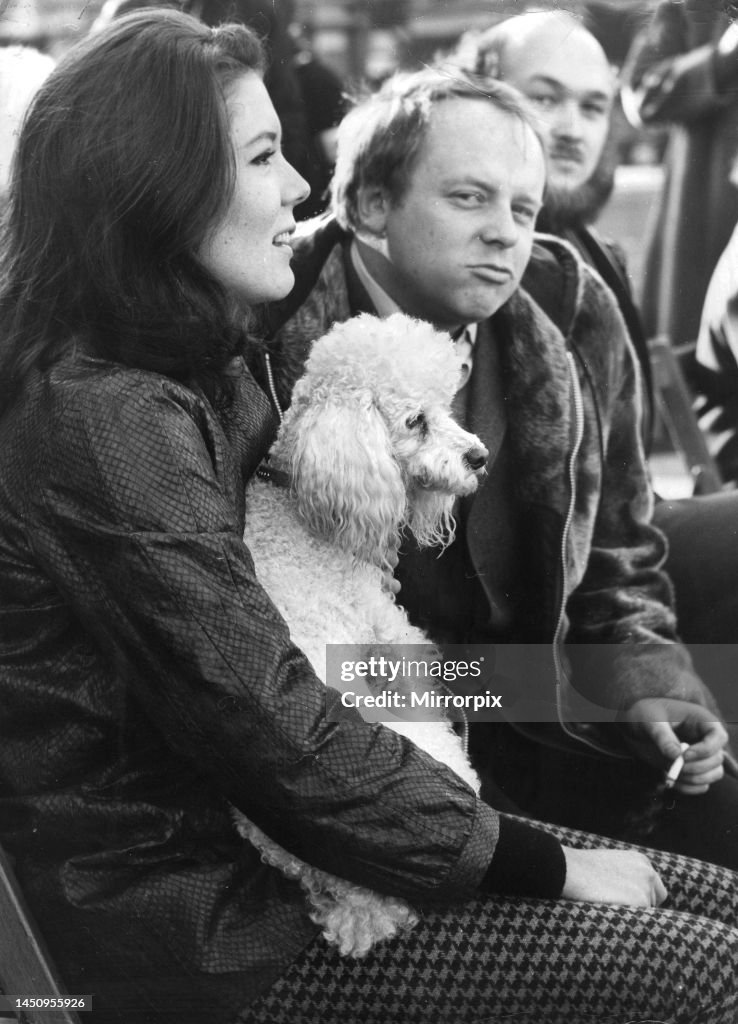 Diana Rigg holding poodle with John Bird at Oxfam charity press call ...