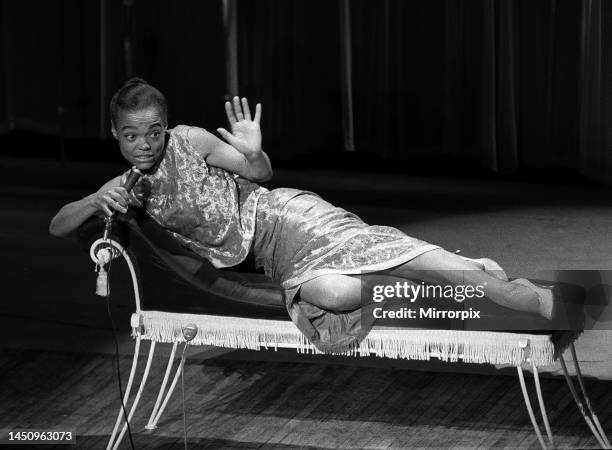 Eartha Kitt with performing on stage during a dress rehearsal of the Royal Variety show performance. 29th October 1962.