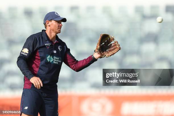 Ashley Noffke, coach of the Queensland receives the ball during the WNCL match between Western Australia and Queensland at WACA, on December 21 in...