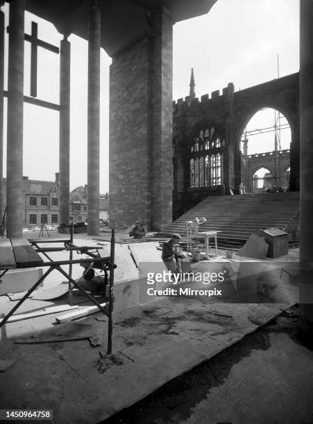 Craftsmen put the finishing touches to the new Coventry Cathedral which stands alongside the old Cathedral which was destroyed in the war. March 1962.