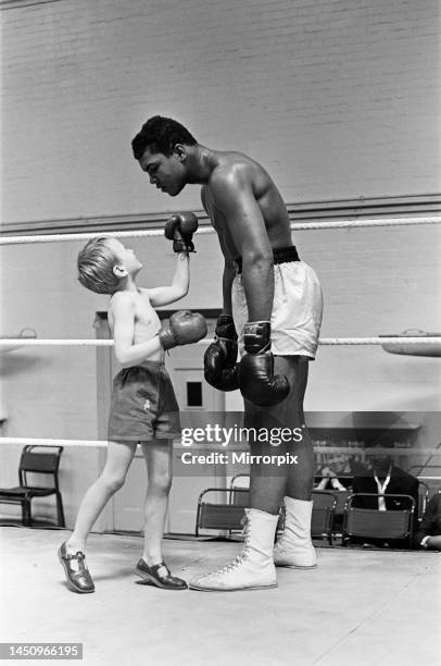 Cassius Clay versus Henry Cooper 1963Cassius Clay with 6 year old Patrick Power during his training camp for the Heavyweight non-title fight against...