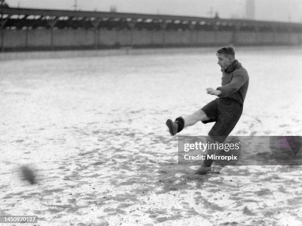 Bradford City FC training session in the snow. Davis taking shots at goal. 11th February 1930.