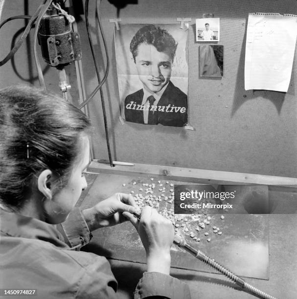 False teeth factory in Dundee: The factory that makes and bakes in their kiln false teeth for NHS dentists. Circa 1963.