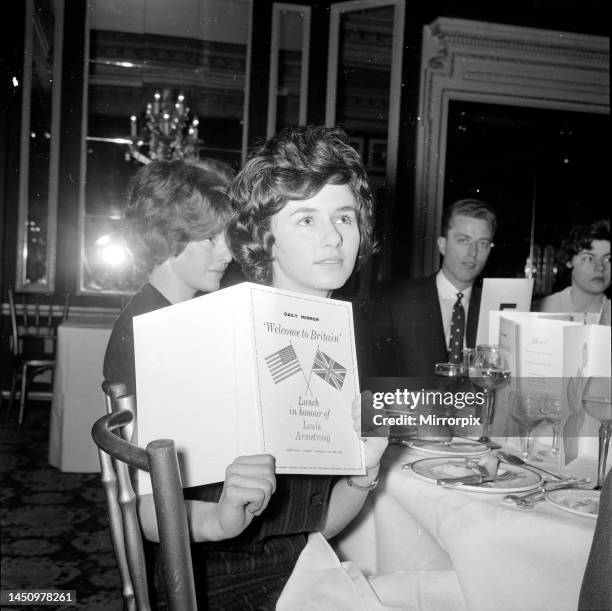 Janet Baldwin was one of fifty readers who attended the Daily Mirror 'Welcome to Britain' lunch for Louis Armstrong at the Cafe Royal in London. 3rd...