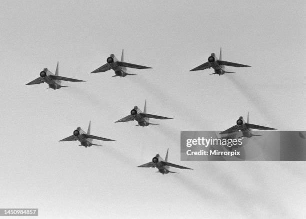 English Electric Lightnings F1 XM740 of the RAF 74 Tiger Sqd in a formation flying routine at the 1962 SBAC show at Farnborough. September 1962.