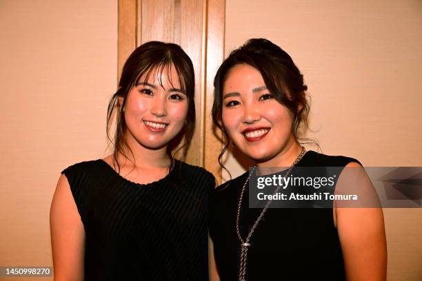 Yuna Nishimura of Japan Ayaka Furue of Japan smile during the JLPGA Awards on December 21, 2022 in Tokyo, Japan.