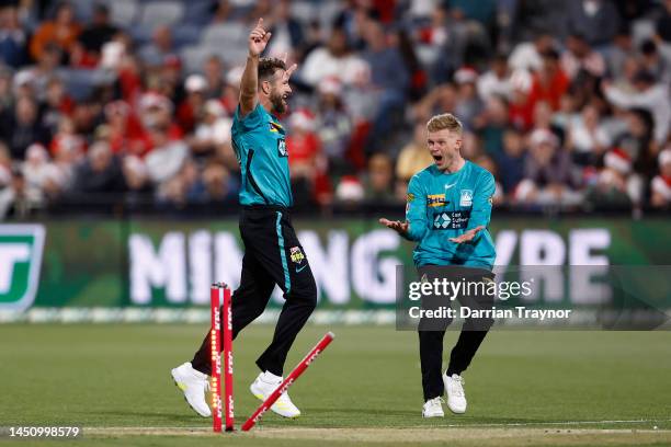 Michael Neser of the Heat celebrates the wicket of Jonathan Wells of the Renegades during the Men's Big Bash League match between the Melbourne...