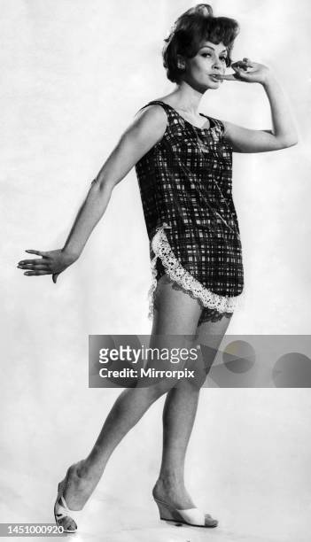 Suzy Kendall wearing an unusual swimming costume with apron style frontage. 12th June 1962.