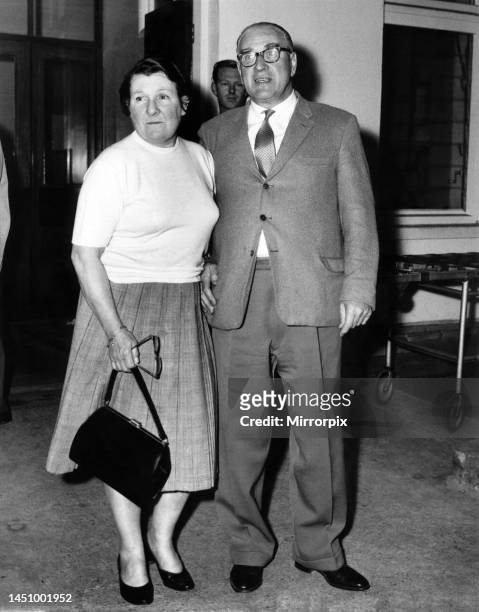Alfred and Aileen Moss, parents of Stirling Moss, leaving the hospital after seeing their son. 24th April 1962.