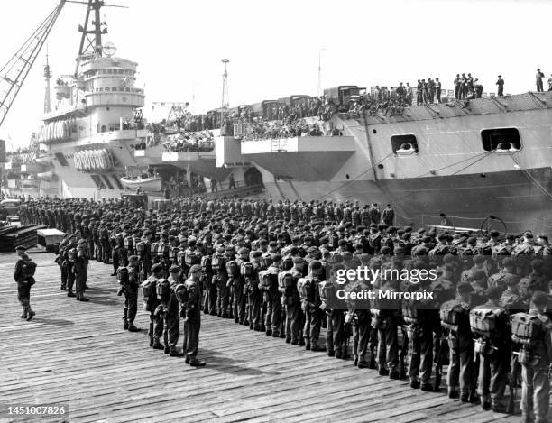 The 16th Independent Parachute Brigade Group travelled from Aldershot to Portsmouth in special trains today and marched to the Royal Naval Dockyard,...