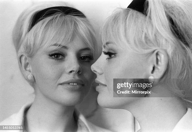 Actress Britt Ekland looking in mirror, circa 1966.