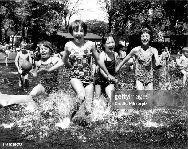 Youngsters cool off in Brandling Park, Newcastle. August 1963.