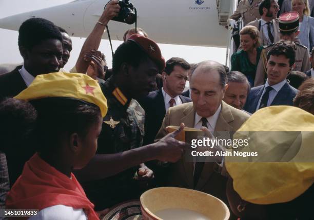 French President Francois Mitterrand received by Thomas Sankara, President of Burkina Faso, on November 17, 1986 in Ouagadougou, Burkina Faso.