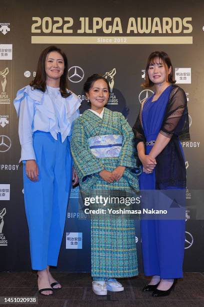 Ayaka Watanabe, Serena Aoki and Nozomi Uetake of Japan pose during the JLPGA Awards on December 21, 2022 in Tokyo, Japan.