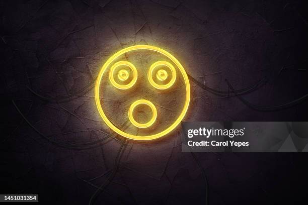 surprised  emoji in neon style - excitement emoji stock pictures, royalty-free photos & images