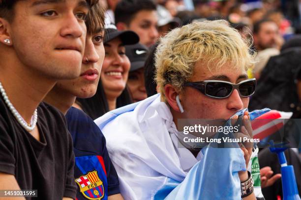 Argentinian fans react during the live transmission of the FIFA World Cup Qatar final between Argentina and France in Bogota, Colombia, December 18,...